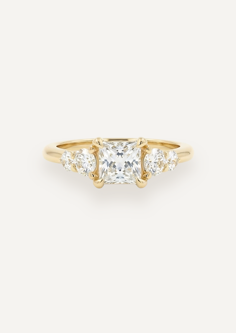 Front view of the Vera five-stone ring with a princess-cut diamond and graduated round side stones