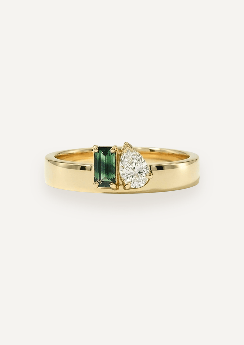 The Cleo Toi et Moi Ring with Emerald Cut Parti Sapphire and Pear Cut Diamond (0.69 TCW)