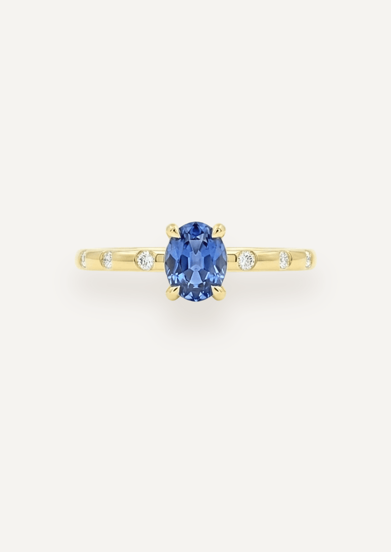 The Constance 18ct Yellow Gold Ring with 0.87ct Oval Cut Ceylon Sapphire & Hammer-Set Diamonds