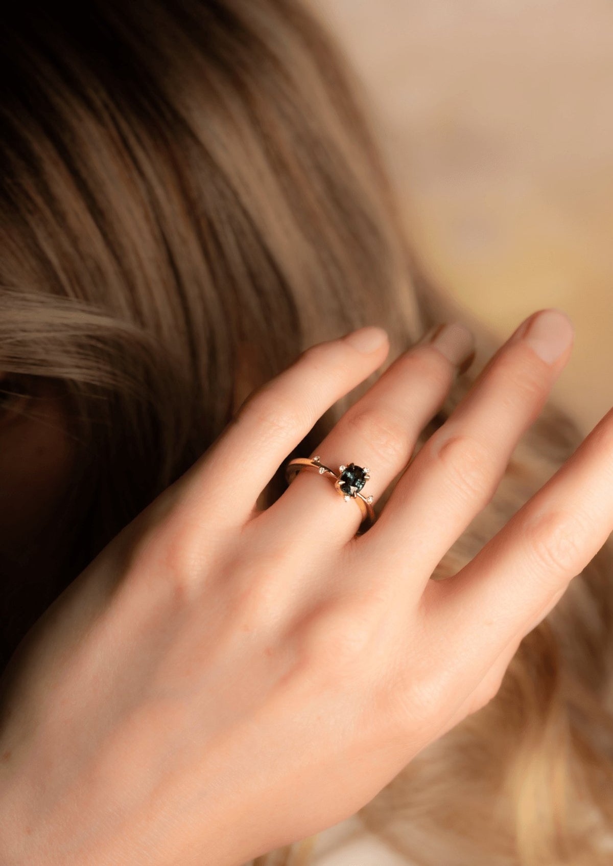 The Juniper Ring with Oval Parti Sapphire design detail