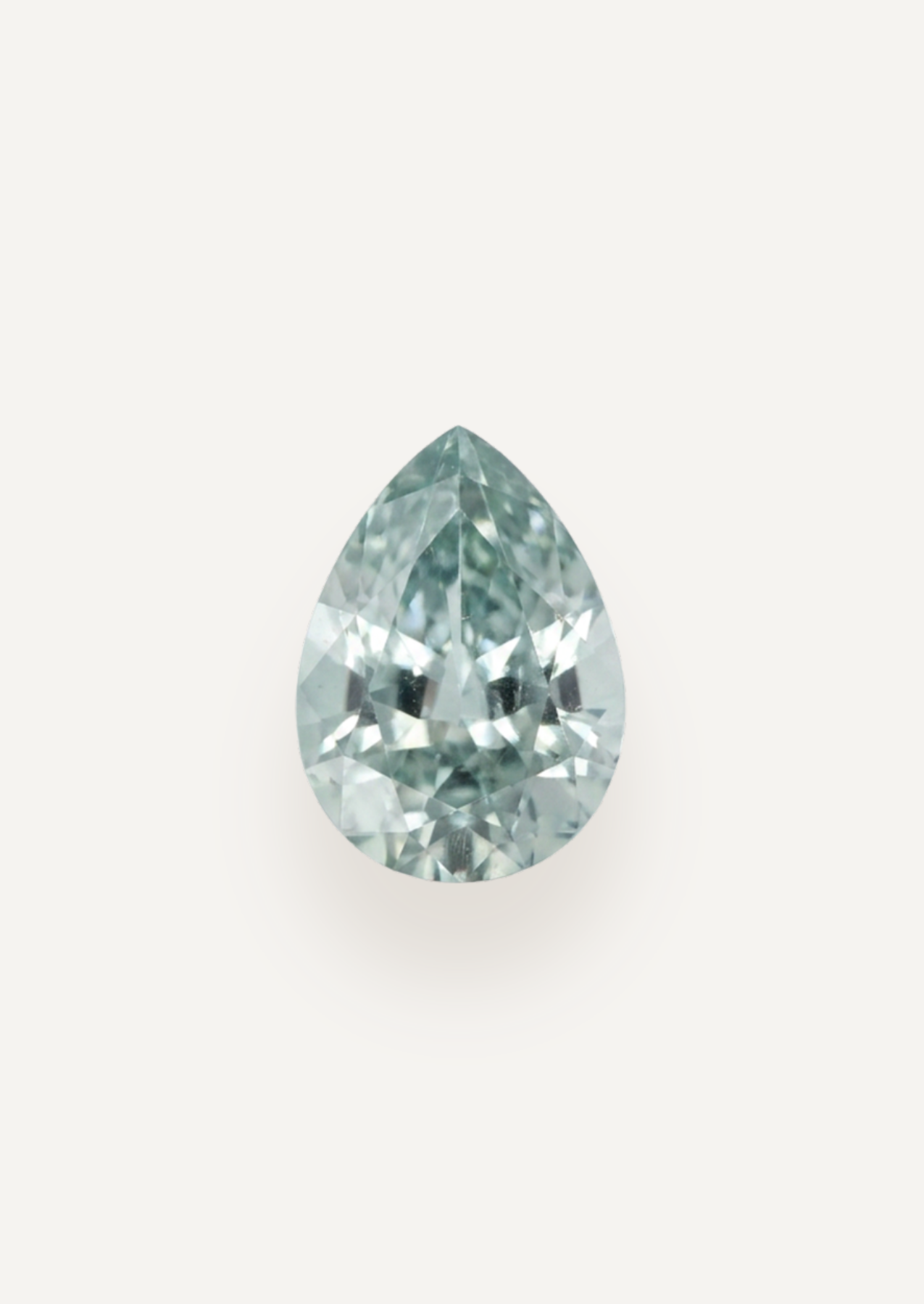 Face up product view showing very pale blue in a tapered drop with an airy centre.
