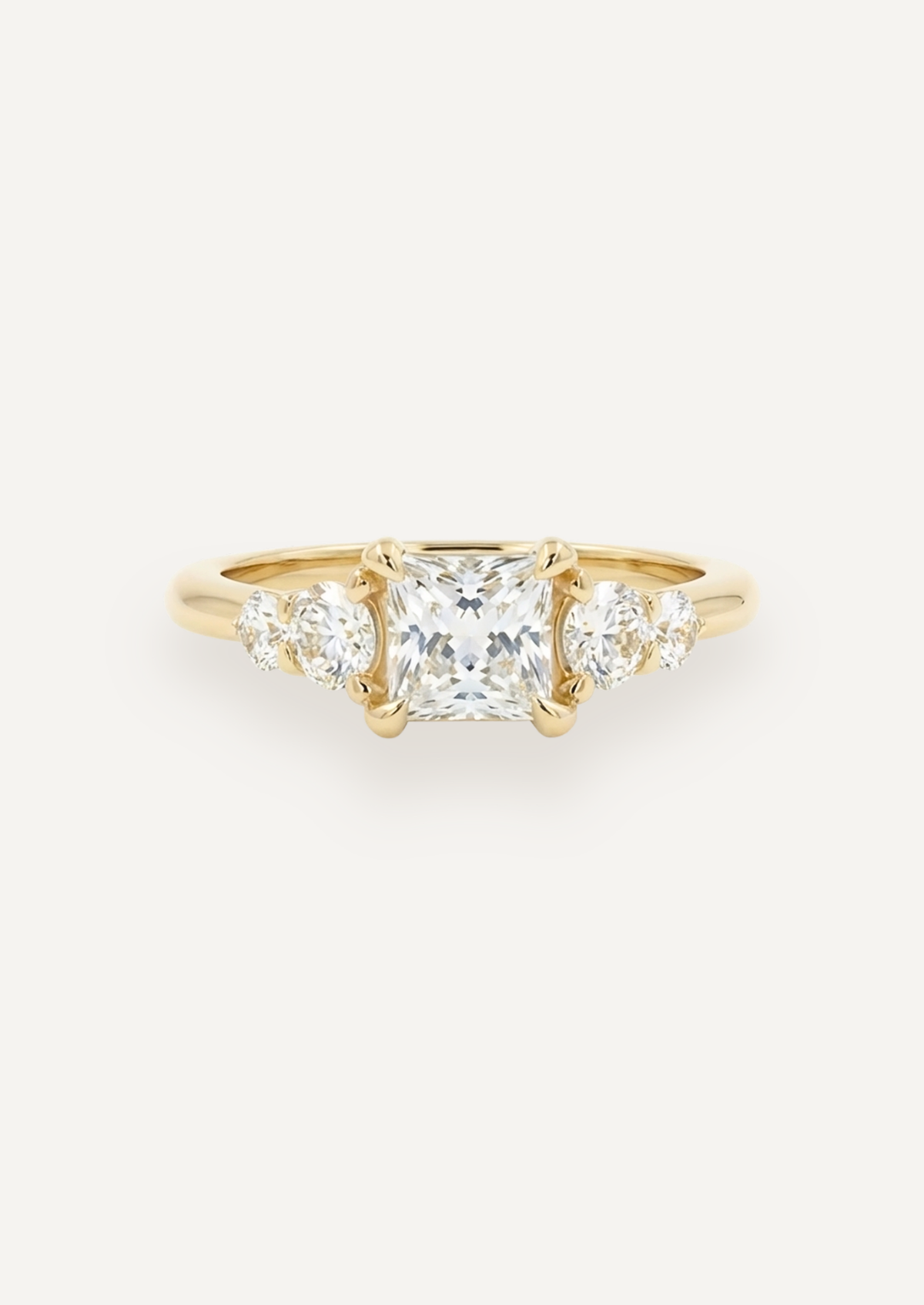 Front view of the Vera five-stone ring with a princess-cut diamond and graduated round side stones
