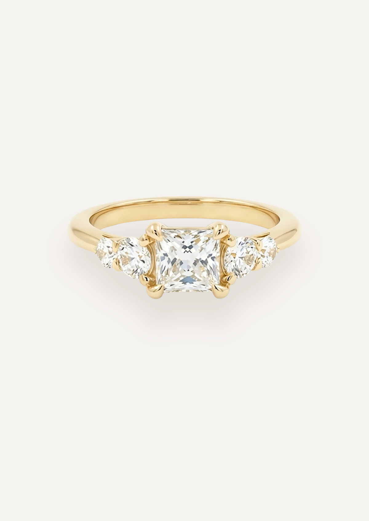 Front view from above of the Vera five-stone ring with a square centre and balanced side stones