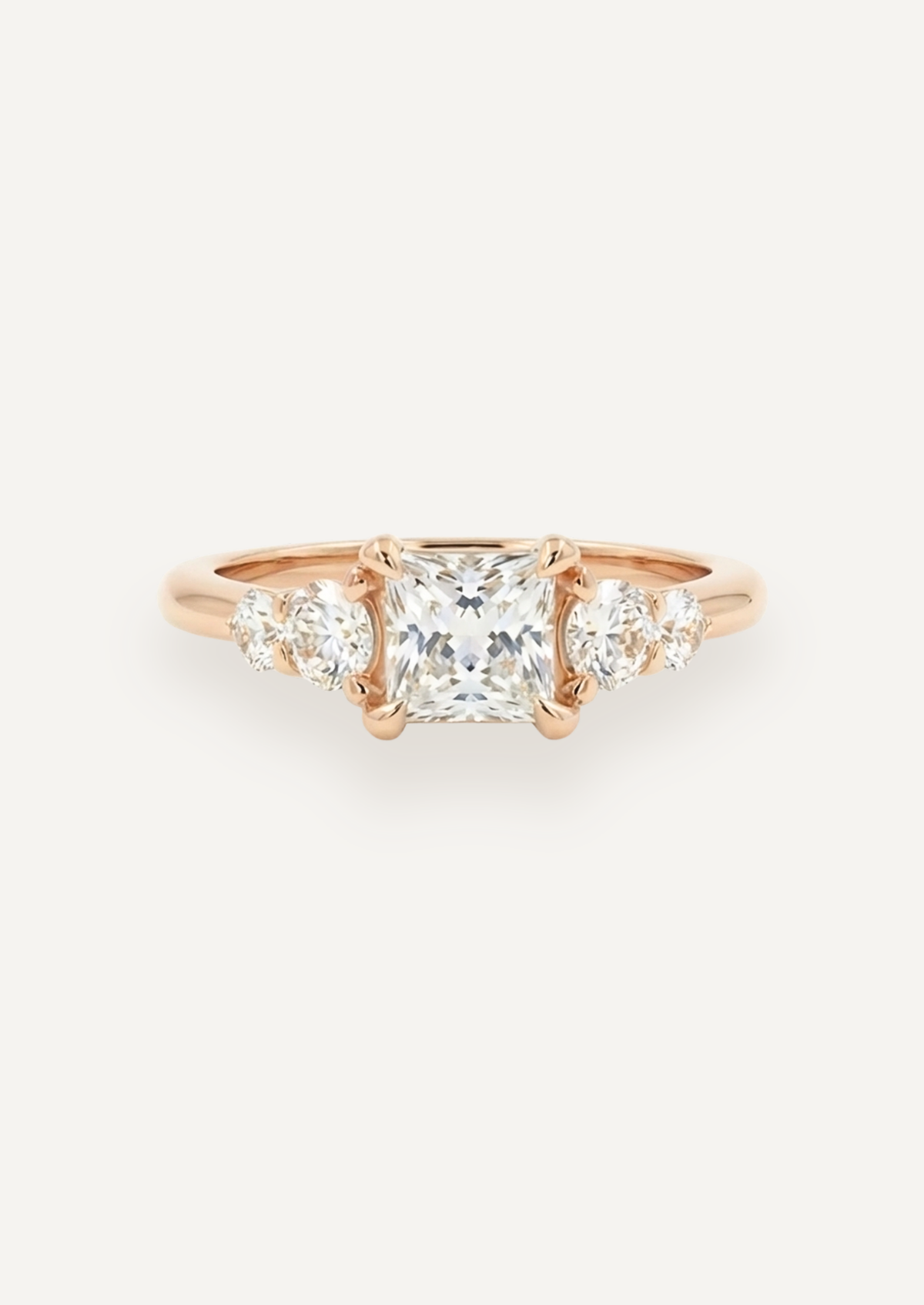 Front view of the Vera five-stone ring in rose gold
