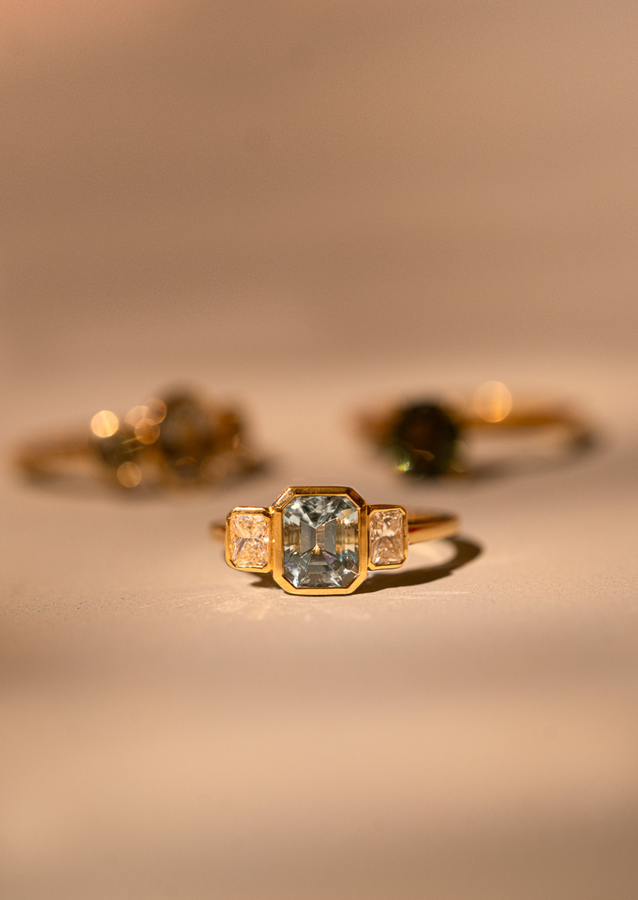 The Beatrice Three Stone Ring with 1.38ct Emerald Cut Aquamarine & .53ct Radiant Cut Diamonds (TDW)