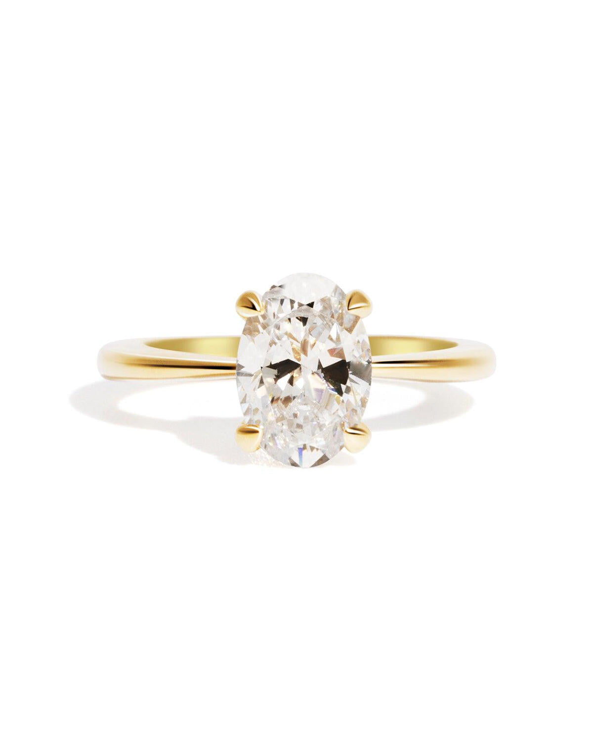 Yellow gold, white diamond, solitaire engagement ring with four claws