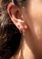 The Peach Pink Sapphire Huggie Earrings