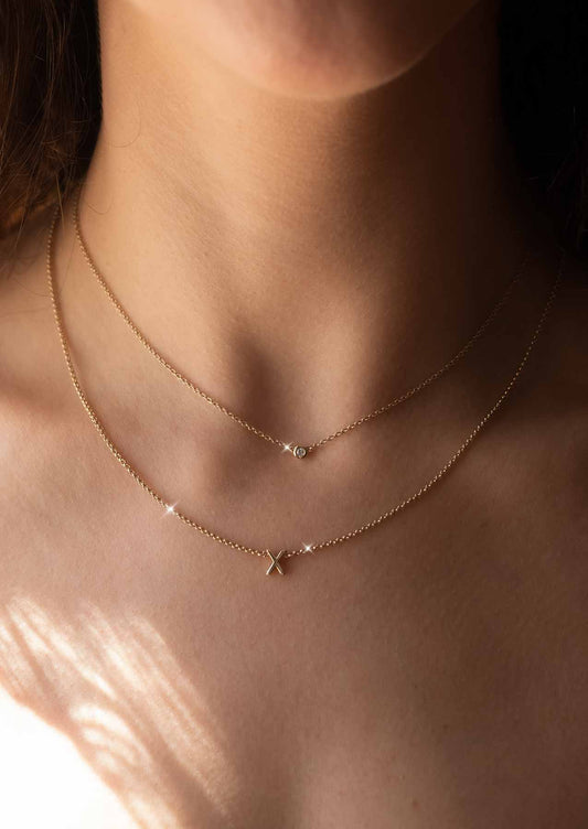 The Solid Gold Diamond Dot Necklace